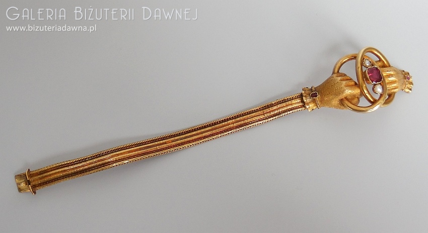 Złota bransoleta z motywem dłoni na złotej taśmie - XIX w.